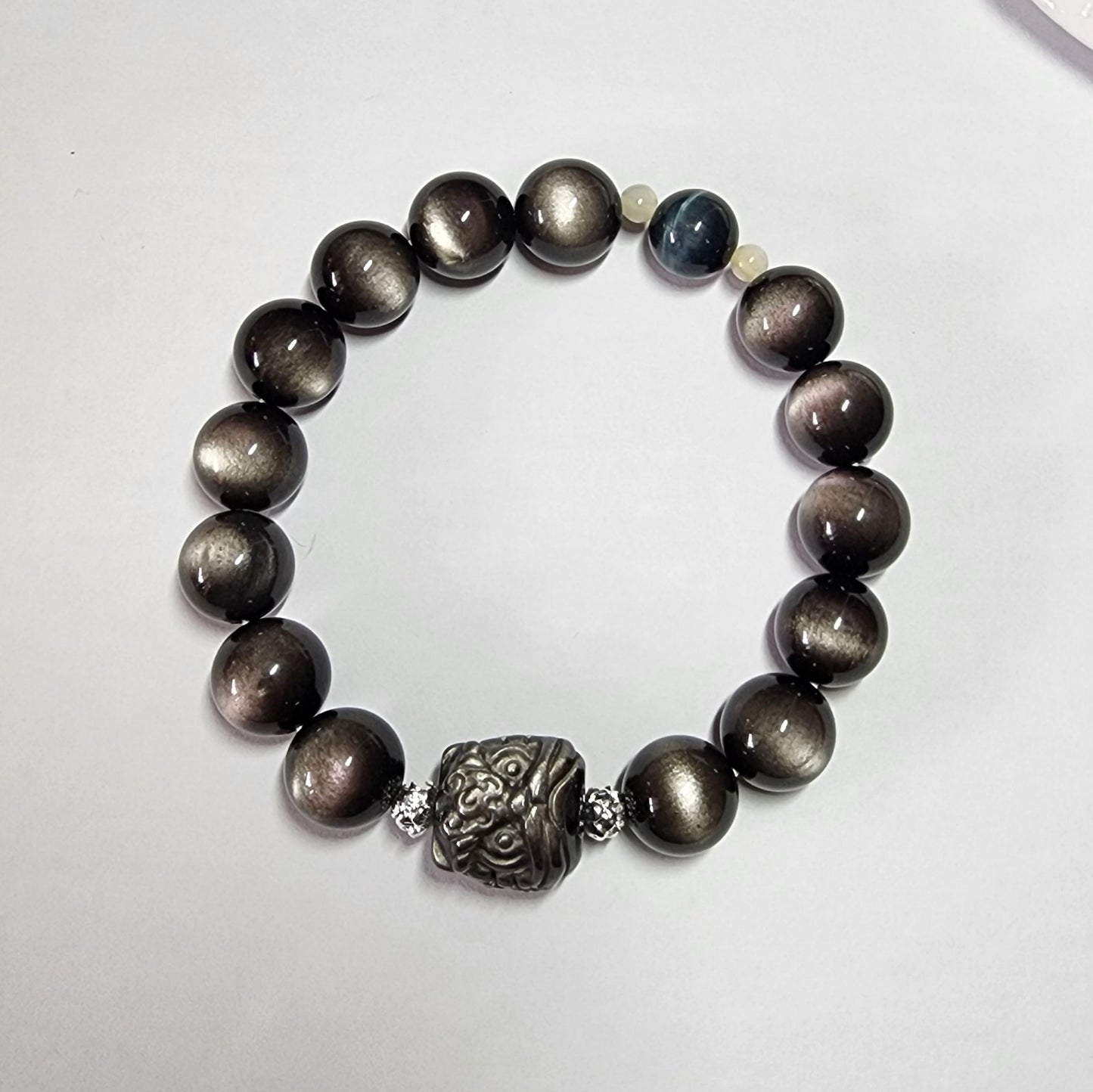 Highest quality

12mm Dancing lion Silver Obsidian
Bracelet