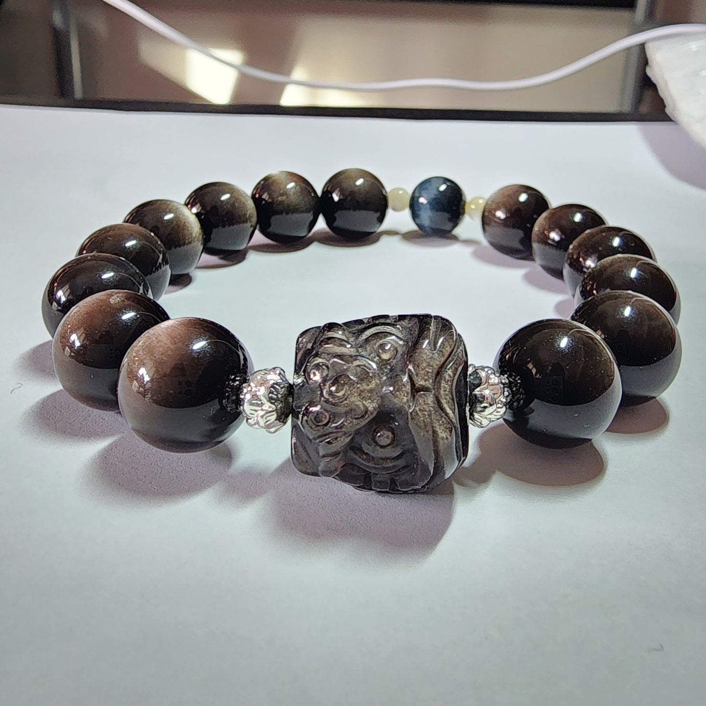 Highest quality

12mm Dancing lion Silver Obsidian
Bracelet